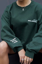 Load image into Gallery viewer, Female model wearing AHL Apparel Made With Care Heather Green oversized sweatshirt