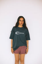 Load image into Gallery viewer, Female model styling grey conscious collection t-shirt
