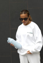 Load image into Gallery viewer, Female modelling white MWC tracksuit
