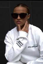 Load image into Gallery viewer, Female modelling white MWC sweatshirt
