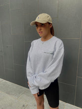 Load image into Gallery viewer, Female modelling grey MWC sweatshirt
