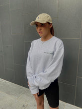 Load image into Gallery viewer, Model wearing AHL Apparel Made With Care Heather Grey oversized sweatshirt
