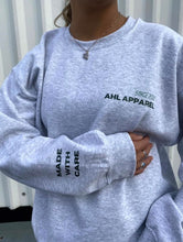 Load image into Gallery viewer, Model wearing AHL Apparel Made With Care Heather Grey oversized sweatshirt
