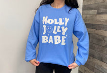 Load image into Gallery viewer, Female wearing blue holly jolly babe sweatshirt
