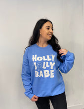 Load image into Gallery viewer, Female wearing blue holly jolly babe sweatshirt
