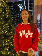 Load image into Gallery viewer, Female standing in front of Christmas trees modelling red jingle sweatshirt
