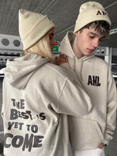 Load image into Gallery viewer, Male and female models styling cream hoodie and beanie
