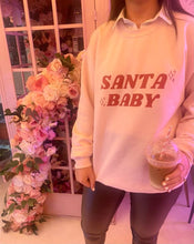 Load image into Gallery viewer, Female wearing cream santa baby sweatshirt
